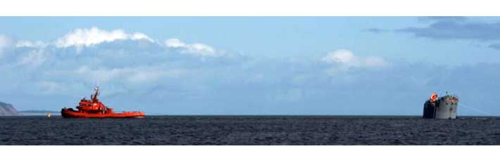 Feed barge towed from Scotland to south of Spain.